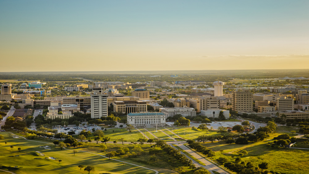 Aerial view of the Texas A&amp;M University campus at sunset